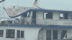 Tourist boat that capsized and killed at least 35 people in Vietnam towed to shipyard for investigation